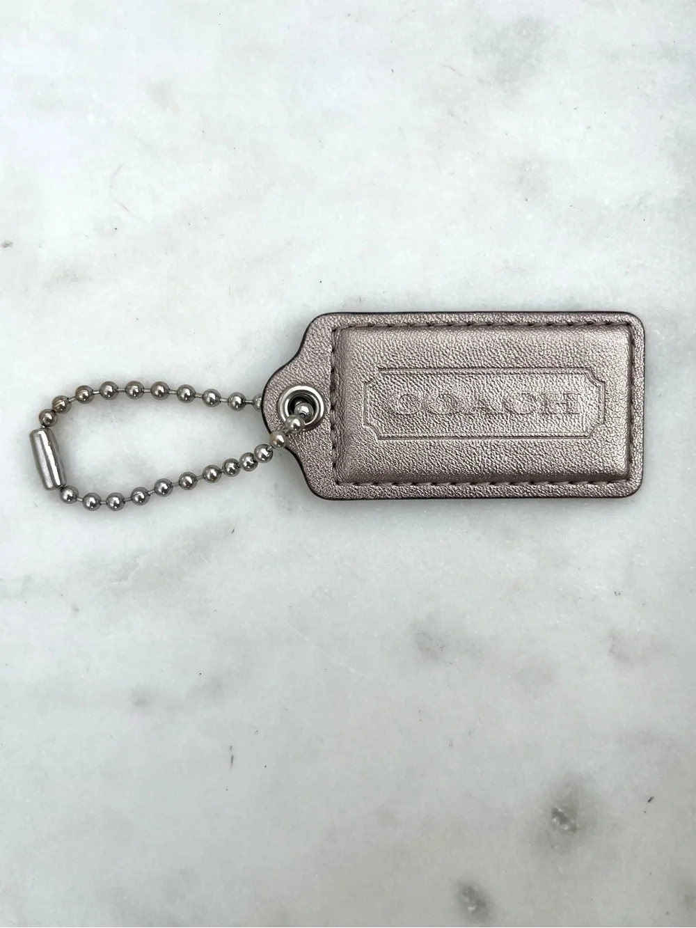 COACH Vintage Metallic Leather Hang Tag, Silver Gold